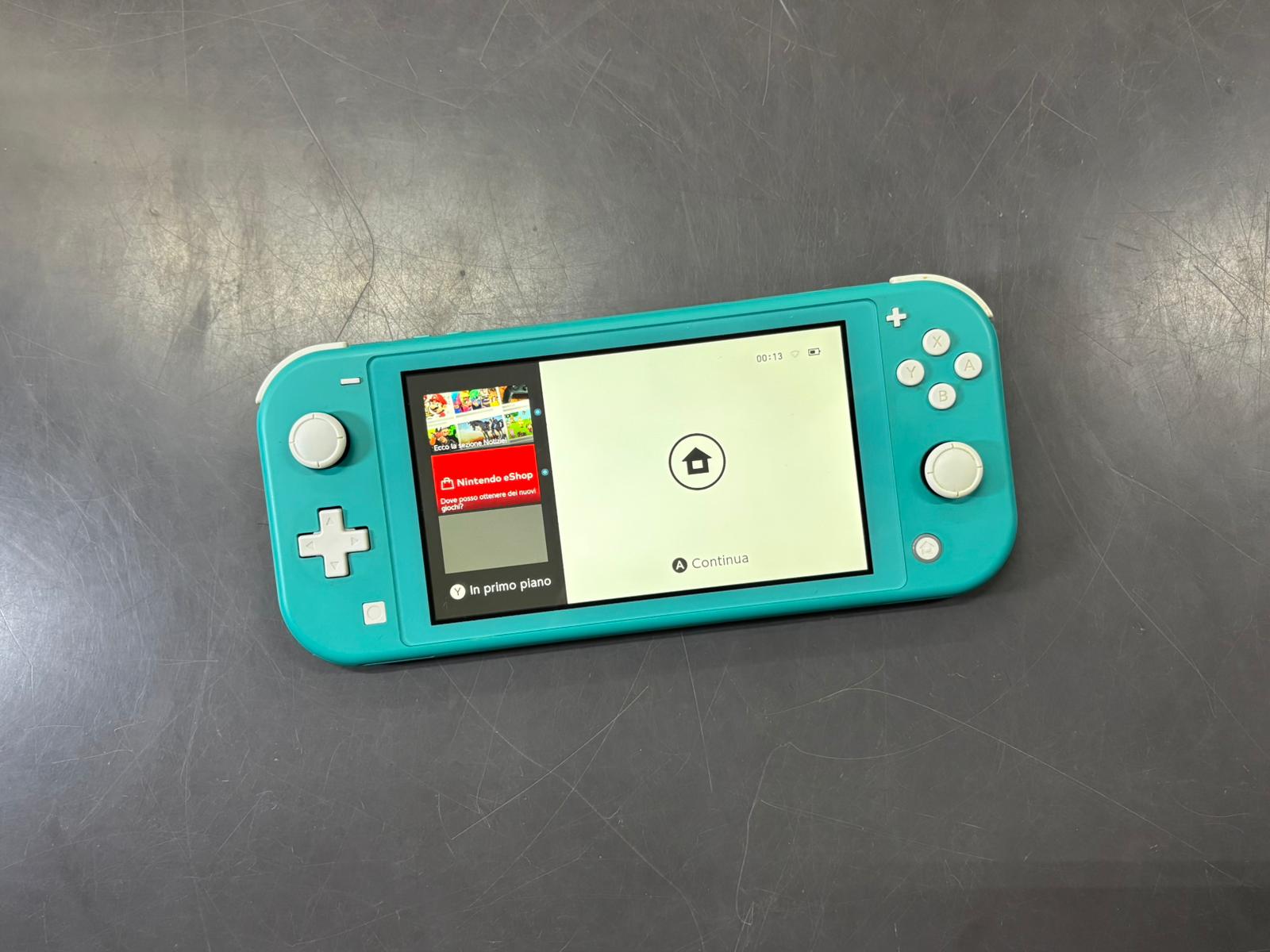 Nintendo Switch lite Turchese Boxata - immagine 3